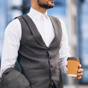 Portrait of business man by the skyscraper
